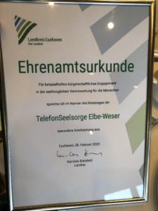 Übergabe einer Ehrenamtsurkunde